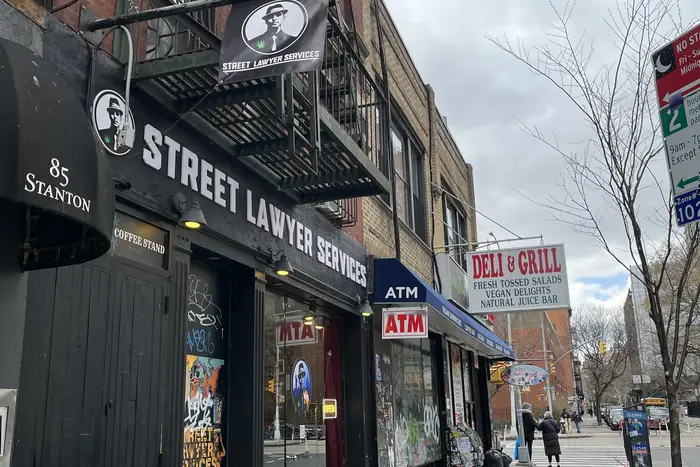Street Lawyer Services is one of several unlicensed marijuana dispensaries that have popped up on the Lower East Side in recent months. The shop says its gifting model, in which someone purchases digital content and gets cannabis for free, doesn't violate the law.